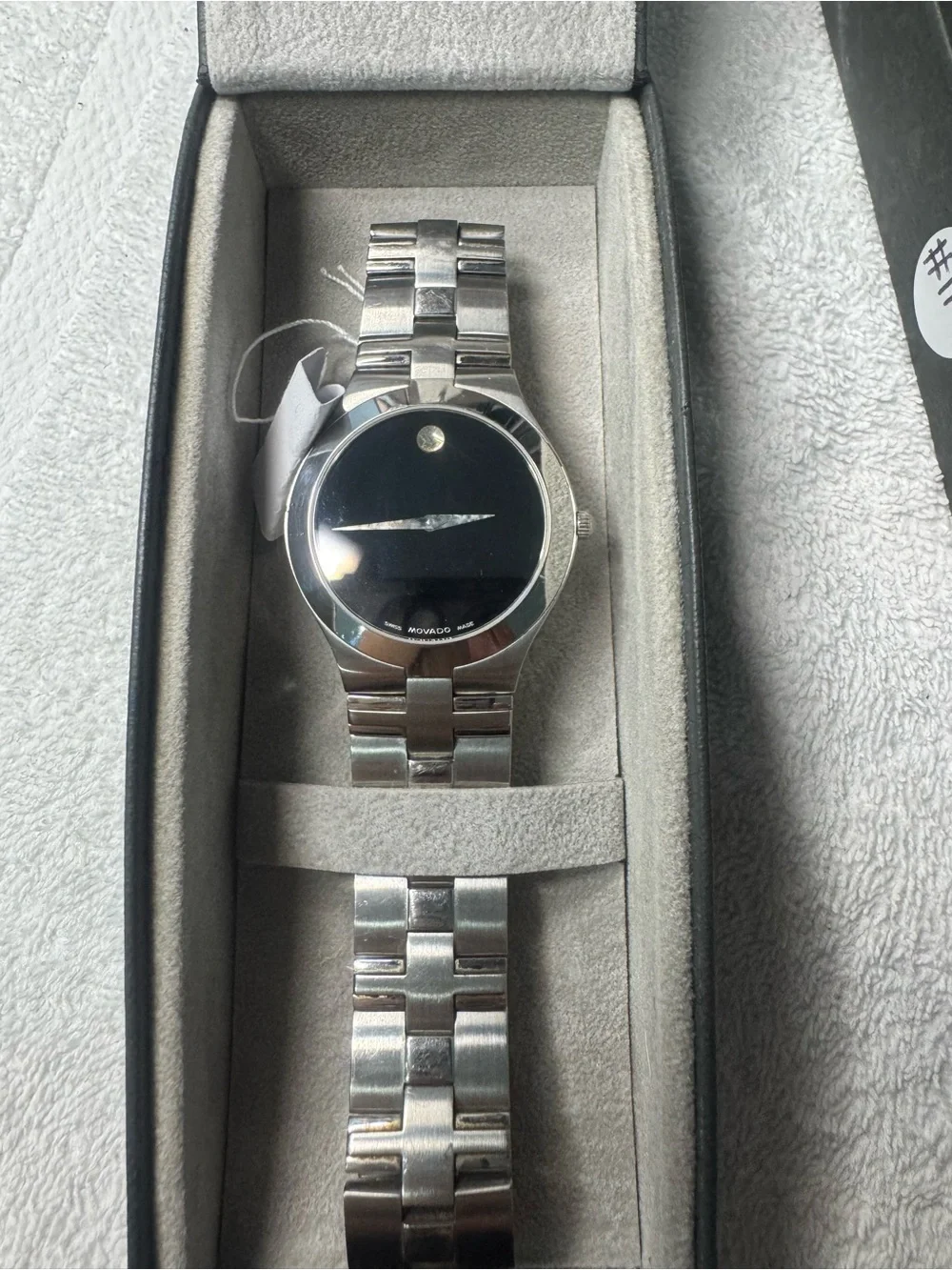 #119 Movado Men's Stainless Steel Watch with Black Dial and Silver Bracelet